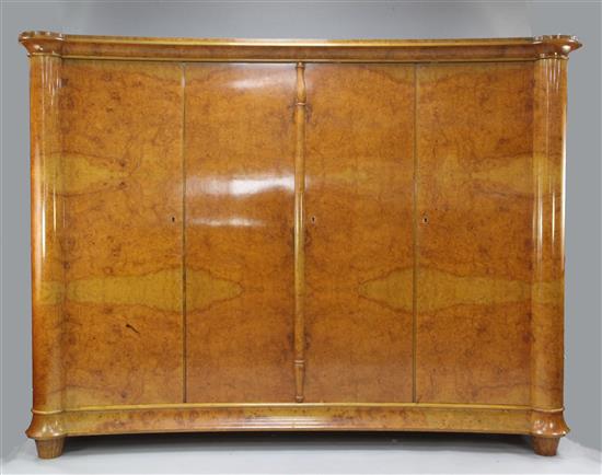 A large 20th century French burr walnut four door wardrobe, W.8ft 8in.